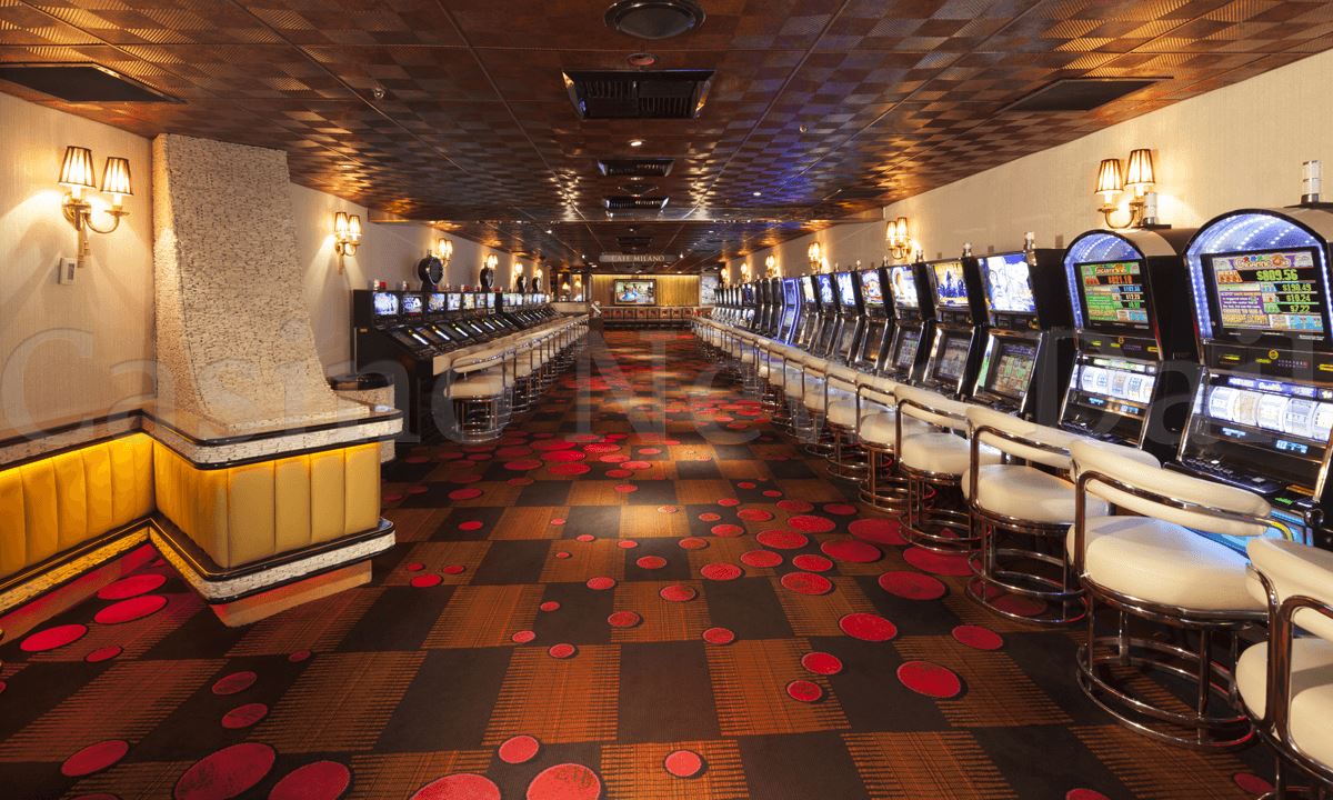 Photo of a casino with many slots